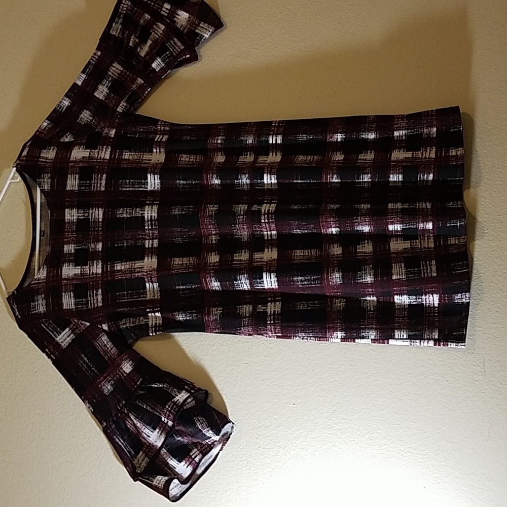 A gorgeous dress.  Multi block colors,  maroon,  black and white..